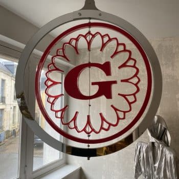 Enseigne Gaumont vintage à marguerite, pièce iconique du cinéma