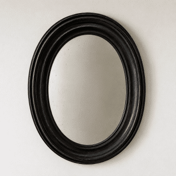 Miroir ovale ancien en bois patiné noir – 53 × 70 cm